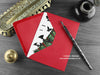 Gothic Bats Christmas card with my original pen and ink illustration of a Gothic Christmas tree, inside an open red envelope. With vintage Victorian pen and writing desk accessories. Design and illustration © Nicola L Robinson | Teeth and Claws