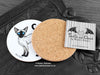 Siamese Cat Coaster featuring my original pen and ink illustration of a Siamese cat, back view showing the cork backing, alongside one of my branded cards. Made in the UK. Design and illustration © Nicola L Robinson | Teeth and Claws.