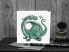 Green Friendly Dragon Greeting Card © Nicola L Robinson | Teeth and Claws